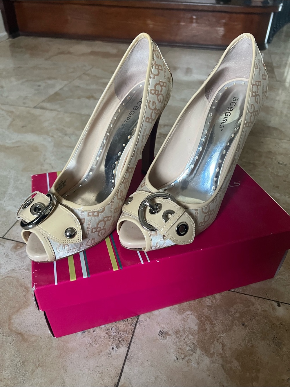 BCBGeneration Cream Logo Peep-Toe Heels with Buckle Accent